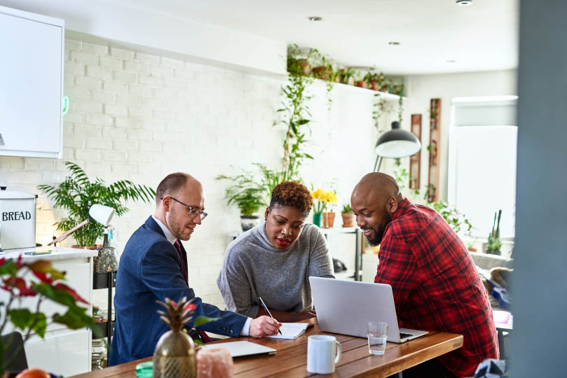 Couple meeting with a financial advisor